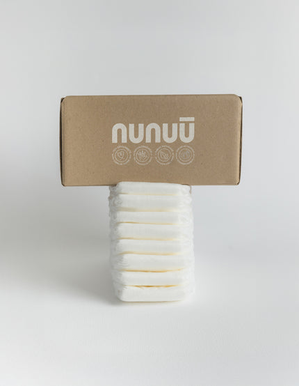 Una torre de pañales, Nunuū, con la caja 